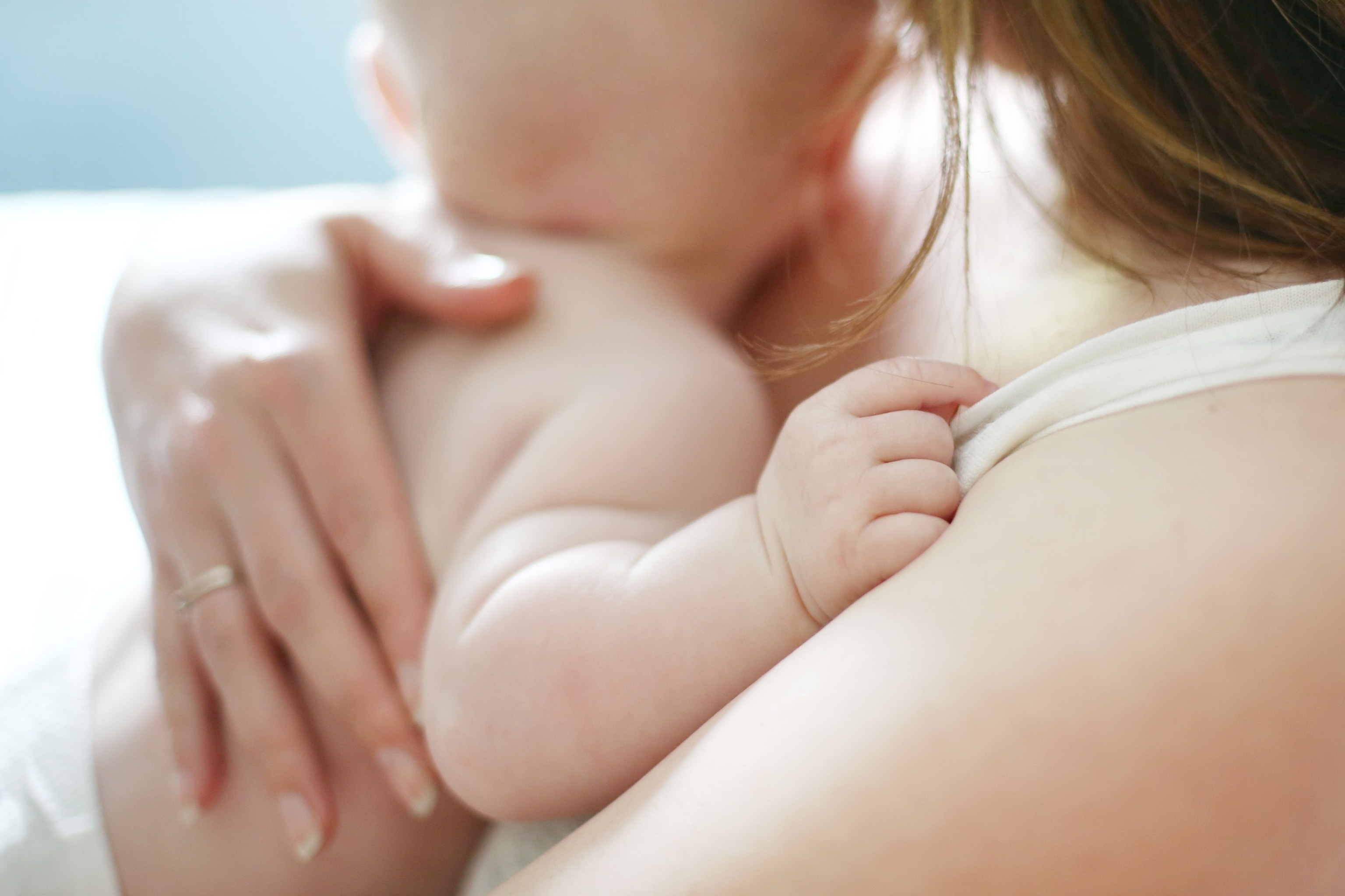 PHOTO: A baby held by mother in undated stock photo.